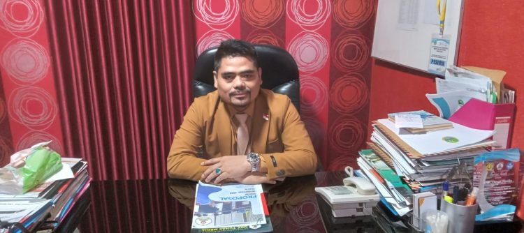 Kepala SMK Tunas Media, Roni Madropi, SH., S.Pd., M.Si.