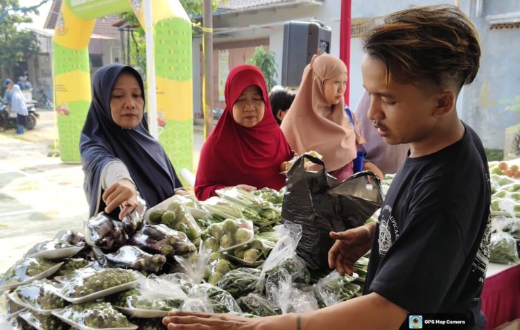 Gerakan Pangan Murah di Tajur Halang, Warga Antusias Dapatkan Sembako Murah